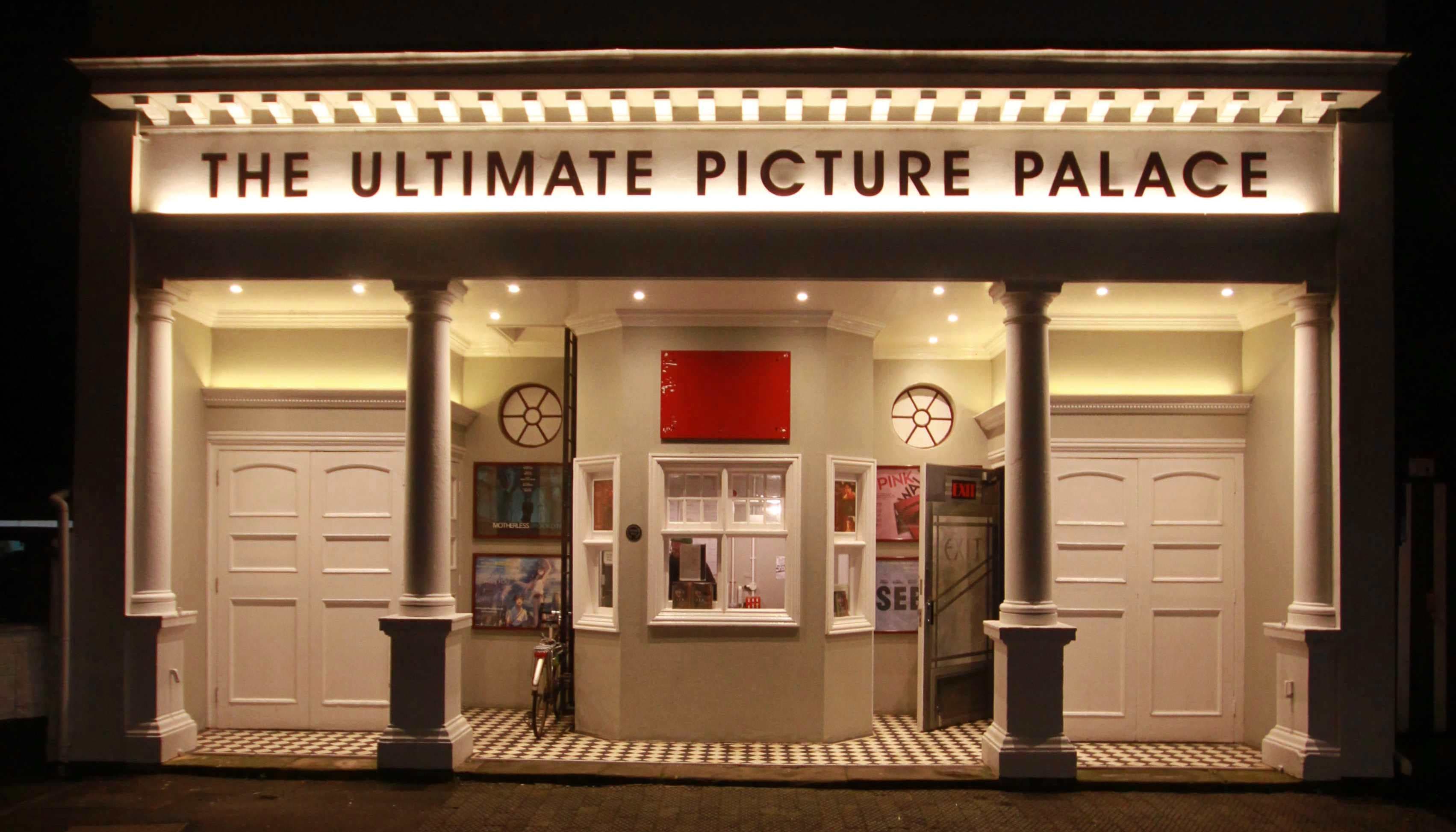 The illuminated entrance of the Ultimate Picture Palace cinema just off Cowley Road